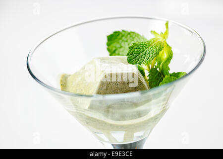 Basil ice cream with basil leaf. Stock Photo