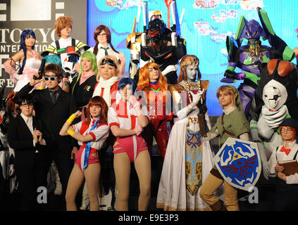 Tokyo, Japan. 26th Oct, 2014. Costume players pose for photos during the World Cosplay Summit at the Tokyo International Film Festival in Tokyo, Japan, Oct. 26, 2014. Participants from an array of countries attended the summit to perform the animation scenes. Credit:  Stringer/Xinhua/Alamy Live News Stock Photo