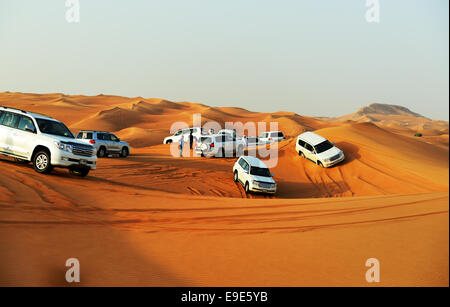 The Dubai desert trip in off-road car is major tourists attraction Stock Photo