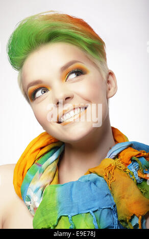 Funny Smiling Woman with Colored Hairs Looking Up Stock Photo
