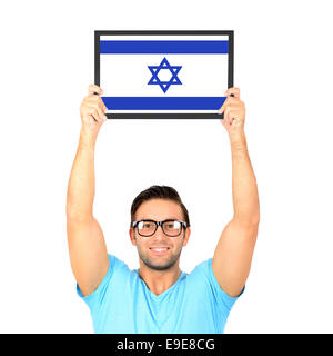 Portrait of a young casual man holding up board with National flag of Israel Stock Photo