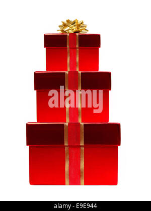Stack of red gift boxes with ribbon and gold bow isolated on white Stock Photo