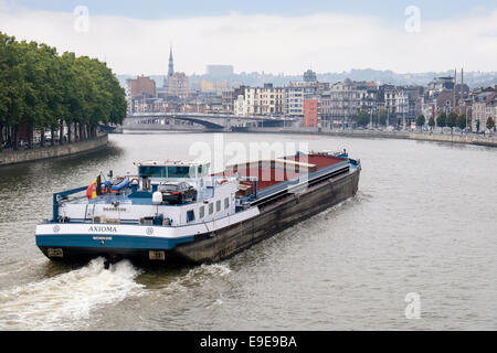 Cargo barge sailing along the River Meuse in Liege, Wallonia, Belgium, Europe Stock Photo