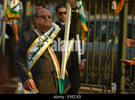 Cairo, Egypt. 26th Oct, 2014. Members of Egyptian sufi muslim group parade the street during a ritual to commemorate the Hijri New Year, also known as Islamic New Year, in Cairo on October 26, 2014. The Islamic year lasts for about 354 days and consists of 12 months. Muharram is the first month and some Muslims mark the start of the Islamic year on the first day of Muharram Credit:  Amr Sayed/APA Images/ZUMA Wire/Alamy Live News Stock Photo