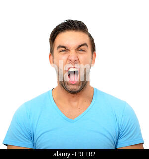 Portrait of angry man screaming against white background Stock Photo