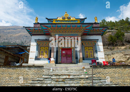 Buddhist temple in Upper Pisang on a Annapurna Circuit - most popular tourists trek in Himalayan mountain massive in Nepal. Stock Photo