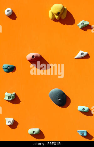 Rock climbing wall with toe and hand hold studs Stock Photo