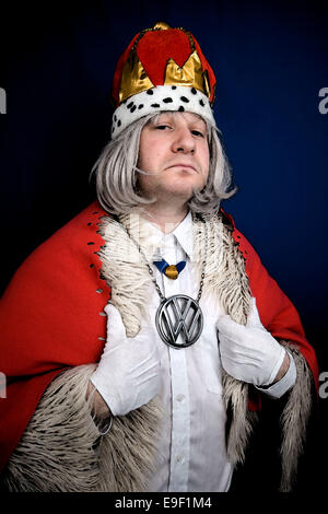 a man dressed as a member of the royal family in a king comedy outfit Stock Photo