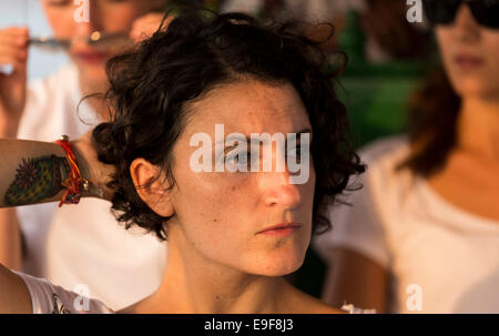 Young woman with a cactus tattooed on the right arm. Stock Photo