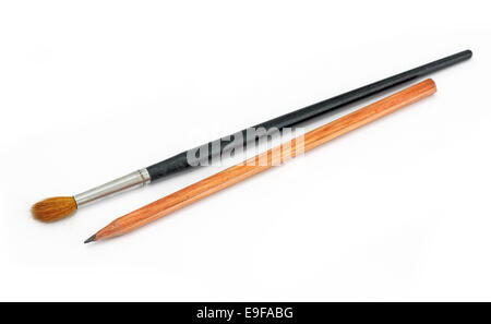 pencil and paint brushes on white background Stock Photo