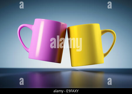 weightless coffee mugs Stock Photo