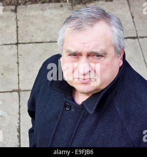 Portrait of grey-haired mature man Stock Photo