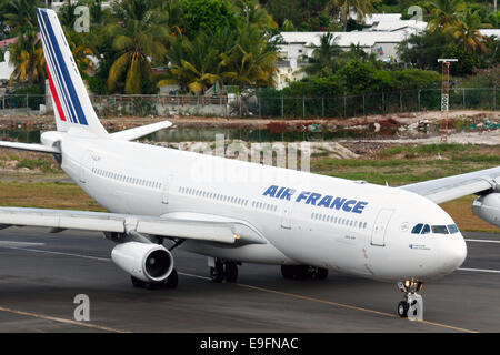 Air France Airbus A340-300 taxis into position for takeoff at St. Maarten airport. Stock Photo