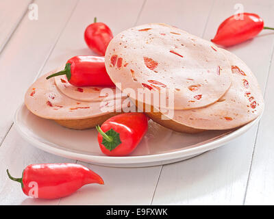Sandwiches topped with sausage Stock Photo