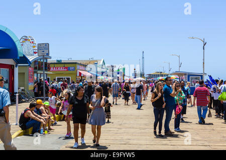 Crowds of people on Santa Monica pier, Los Angeles, California, USA Stock Photo