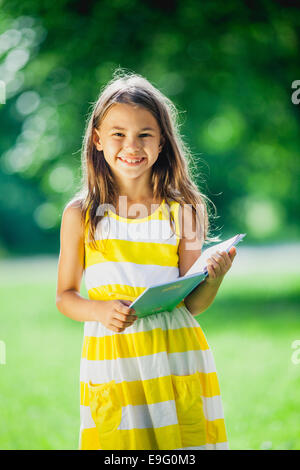 five-year-old girl on the nature Stock Photo