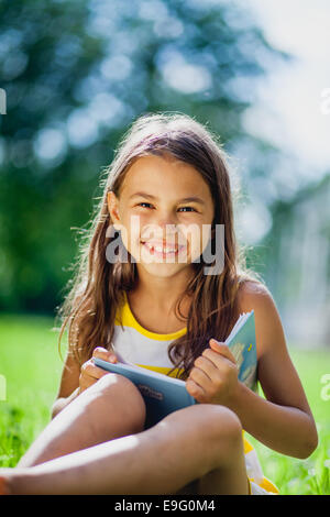 five-year-old girl on the nature Stock Photo