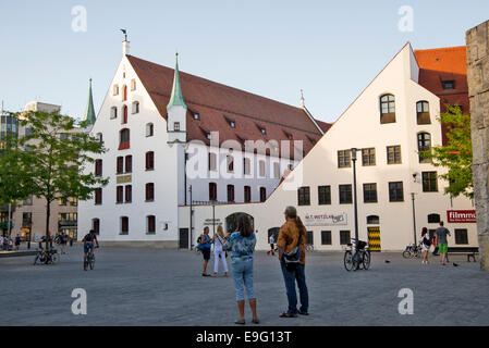Foreign tourists admire of old square, Munich, München, capital state of Bavaria, Germany, Europe. Stock Photo
