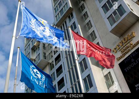 Copenhagen, Denmark. 27th October, 2014.  The UNited Nation (UN) and the  UNited Nations Environment Programme (UNEP) flags (photo, left) at the UN Climate panel meeting venue – the Tivoli Congress Hotel – in Copenhagen. The meeting begins this Monday and ends SUNday, November 2nd, with a press conference. Credit:  OJPHOTOS/Alamy Live News Stock Photo