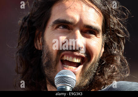 Russell Brand, comedian, speaking at The People's Assembly demonstration against Austerity, Parliament Square, London, 21st June Stock Photo
