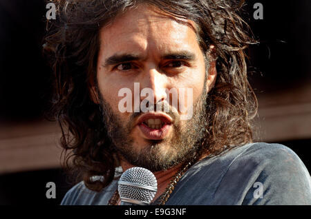 Russell Brand, comedian, speaking at The People's Assembly demonstration against Austerity, Parliament Square, London, 21st June Stock Photo