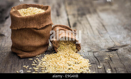 Brown rice bags Stock Photo