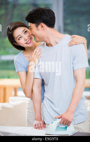 Young couple doing housework Stock Photo