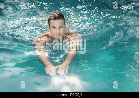 young man swimming Stock Photo