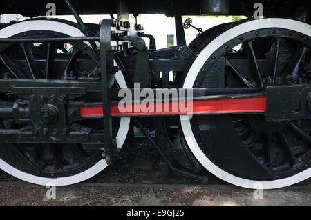 The wheels of an old steam engine on display in London, Ontario in Canada. Stock Photo