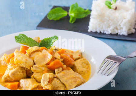 chicken curry indian style with rice a mint Stock Photo