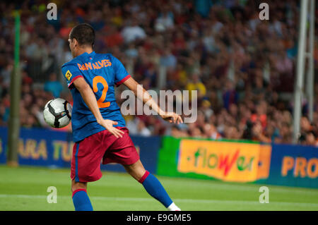 BARCELONA - AUG 19: Dani Alves, F.C Barcelona player, plays against Manchester City. Joan Gamper Throphy at the Camp Nou Stadium Stock Photo