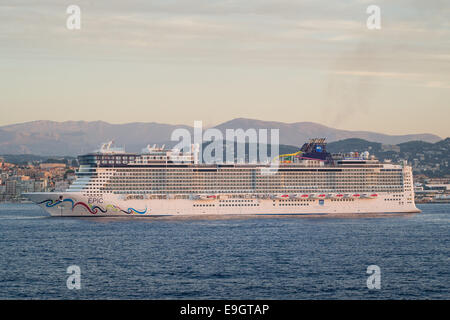 Norwegian Cruise Line's Norwegian Epic anchored off the coast of Cannes, France. Passengers disembarked via tender boats. Stock Photo