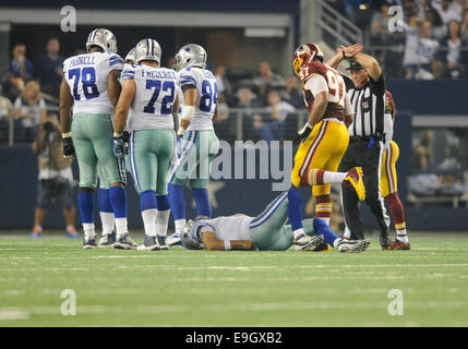 Arlington, TX, USA. 27th October, 2014. Dallas Cowboys quarterback Tony Romo #9 is sacked and injured in the third quarter during an NFL football game between the Washington Redskins and the Dallas Cowboys at AT&T Stadium in Arlington, TX Washington defeated Dallas 20-17 in OT Credit:  Cal Sport Media/Alamy Live News Stock Photo