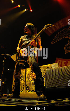 BARCELONA - NOV 25: Five Finger Death Punch (5FDP), heavy metal band, performs at Pavello Olimpic de Badalona stage. Stock Photo