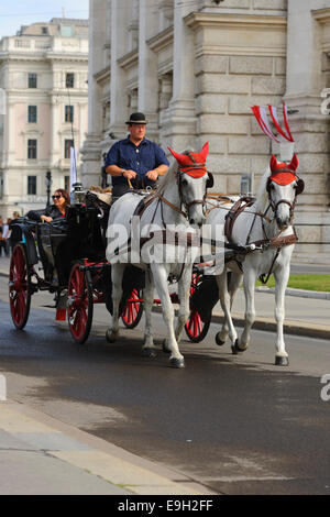 Fiaker, horse-drawn carriage at the Burgtheater, Vienna, Austria Stock Photo