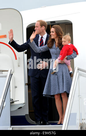 Prince William, Duke of Cambridge, Catherine, Duchess of Cambridge and Prince George of Cambridge depart Australia from Defence Establishment Fairbairn. The Duke and Duchess of Cambridge are on a three-week tour of Australia and New Zealand, the first official trip overseas with their son, Prince George of Cambridge  Featuring: Prince William,Duke of Cambridge,Catherine,Duchess of Cambridge,Prince George of Cambridge Where: Canberra, Australia When: 25 Apr 2014 Stock Photo