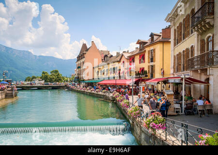 Pavement cafes and tourists in summer in Annecy, France, old town, Europe Stock Photo