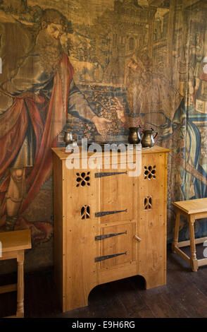 UK, England, Wiltshire, Avebury Manor, Tudor dining room, new oak cabinet with hand made metal hinges Stock Photo