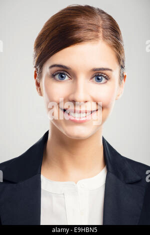 Portrait of a beautiful blonde woman with blue eyes smiling Stock Photo