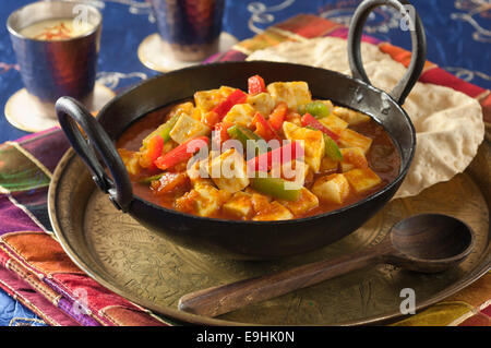Paneer jalfrezi. Vegetarian curry with Indian cheese, tomatoes and peppers.