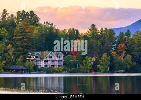 Autumn colors at Mirror Lake in Lake Placid in Adirondacks State Park in the northern part of New York State, USA Stock Photo