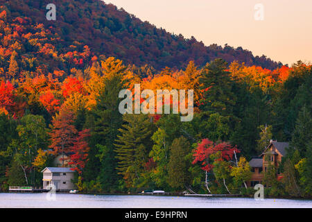 Autumn colors at Mirror Lake in Lake Placid in Adirondacks State Park in the northern part of New York State, USA Stock Photo