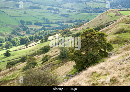 Cracken edge quarries near Chinley in Derbyshire. View of the green countryside below. Stock Photo