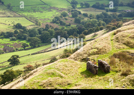 Cracken edge quarries near Chinley in Derbyshire. Winding gear structure. Looking down at the green summer landscape. Stock Photo