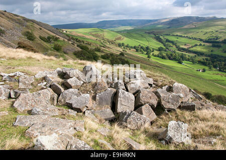 Cracken edge quarries near Chinley in Derbyshire. Gritstone rocks in foreground, view toward Kinder Scout. Stock Photo