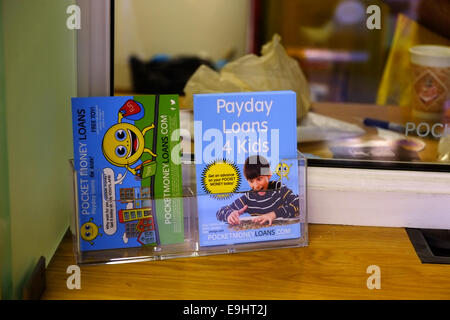 Atom gallery, London, UK. 28th October, 2014. Artist Darren Cullen has set up a parody loan shop in Finsbury park North London offering pocket money loans. Credit:  Rachel Megawhat/Alamy Live News Stock Photo