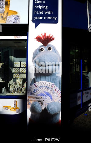 Atom gallery, London, UK. 28th October, 2014. A real loan shop near the parody one Credit:  Rachel Megawhat/Alamy Live News Stock Photo