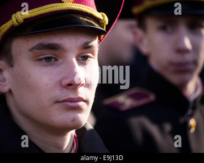 Kiev, Ukraine. 28th October, 2014. Cadet honor guard.  Kiev cadets and schoolchildren at Babi Yar, held a rally on the 70th anniversary of Ukraine's liberation. Babii Yar tragedy known worldwide. During the Second World War, the Nazis executed here 100 thousand inhabitants of Kiev, mainly Jews. Celebration of Ukraine's liberation from the Nazis passed under the Russian occupation of the Crimea and Eastern Ukraine. Credit:  Igor Golovnov/Alamy Live News Stock Photo