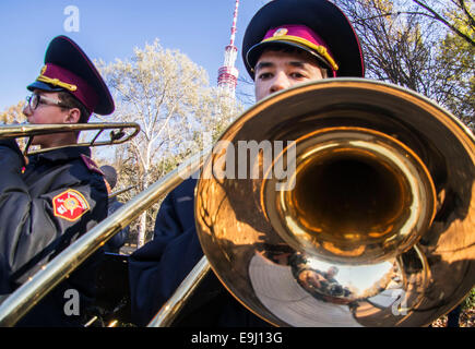 Kiev, Ukraine. 28th October, 2014. Brass Band of Cadets.  Kiev cadets and schoolchildren at Babi Yar, held a rally on the 70th anniversary of Ukraine's liberation. Babii Yar tragedy known worldwide. During the Second World War, the Nazis executed here 100 thousand inhabitants of Kiev, mainly Jews. Celebration of Ukraine's liberation from the Nazis passed under the Russian occupation of the Crimea and Eastern Ukraine. Credit:  Igor Golovnov/Alamy Live News Stock Photo