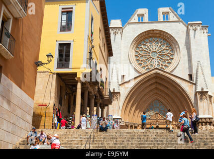 Tarragona, Spain - August 16, 2014: Tourists near the entrance to the Cathedral of Tarragona. Roman Catholic church in Catalonia Stock Photo